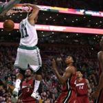 Boston, MA - 02/27/16 - (2nd quarter) Boston Celtics guard Evan Turner (11) completes a reverse dunk to tie the score at 28-28 during the second quarter. The Boston Celtics take on the Miami Heat at TD Garden. - (Barry Chin/Globe Staff), Section: Sports, Reporter: Adam Himmelsbach, Topic: 28Heat-Celtics, LOID: 8.2.1862623082. 
