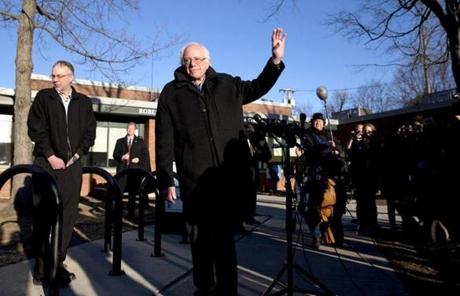 Bernie Sanders waved as he left a news conference after voting in Vermont.
