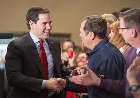  Republican presidential candidate Marco Rubio shakes hands with supporters before speaking during a campaign appearance in Andover, Minnesota, USA, 01 March 2016. People in 12 states are voting in primary elections to determine the candidates for president of the United States of America. EPA/CRAIG LASSIG
