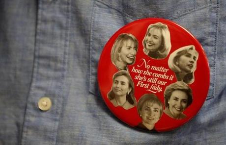 A volunteer wore a button in support of Hillary Clinton in Texas. 
