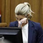 Sportscaster and television host Erin Andrews wipes her eyes as she testifies Monday, Feb. 29, 2016, in Nashville, Tenn. Andrews has filed a $75 million lawsuit against the franchise owner and manager of a luxury hotel and a man who admitted to making secret nude recordings of her in 2008. (AP Photo/Mark Humphrey, Pool)