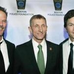From left: Peter Berg, Boston Police Commissioner William Evans, and Mark Wahlberg.
