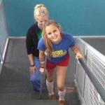 Gillian Reny practiced walking on stairs at Spaulding Rehabilitation Hospital. 