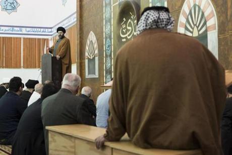 Imam Hassan Qazwini spoke to a congregation about the upcoming presidential primary in Michigan.

