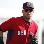 Boston Red Sox' Yoan Moncada practices during spring training, Friday, March 13, 2015, in Fort Myers Fla. The Red Sox have finalized a minor league contract with the 19-year-old Cuban infielder that includes a $31.5 million signing bonus, easily a record for an international amateur free agent under 23 years old. (AP Photo/Brynn Anderson) 