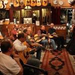 Jeffrey Pepper Rodgers, far right, led his workshop, ?Grateful Dead for Acoustic Guitar,? at the Music Emporium in Lexington in 2013.