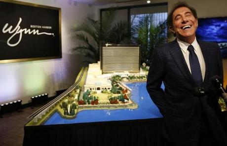 Steve Wynn stood in front of a model of his planned Everett casino.
