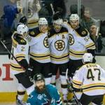The Bruins celebrated a goal by David Krejci (second from right) in the first period against the Sharks.