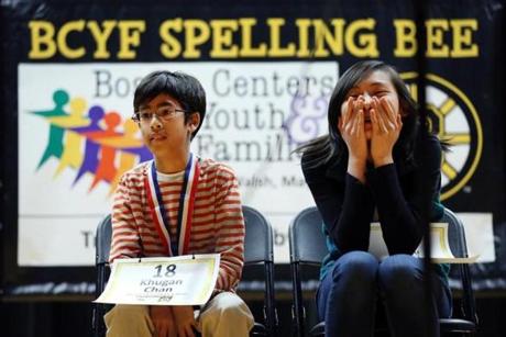 03/19/2016 -Boston, MA- Khugan Chan (cq) , 11, left, sits with Emily Sun (cq) , 13, between rounds of the ninth annual citywide youth Spelling Bee hosted by Boston Centers for Youth and Families at the BCYF Mildred Avenue Community Center in Boston, MA on March 19, 2016. The pair endured 35 rounds before Sun won the championship round. championship round. Sun represented Boston Latin School and Chan represented Quincy Elementary School. (Craig F. Walker/Globe Staff) section: Metro reporter: Annear
