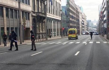 Brussels police blocked off a street after an explosion at a subway station.
