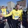 FILE - In this April 19, 2014 file photo, Boston Police Commissioner William Evans leaves the course after running in the 5-kilometer race in Boston in advance of Monday's 118th Boston Marathon. Evans, an avid runner, said Wednesday, March 23, 2016, he has no information suggesting the April 18 Boston Marathon might be targeted anew, but told The Associated Press in an interview that as a precaution he's canceling his own plan to run in the race. (AP Photo/, File)