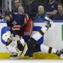 Fans react as New York Rangers' Tanner Glass (15) punches Boston Bruins' Matt Beleskey (39) during the first period of an NHL hockey game Wednesday, March 23, 2016, in New York. (AP Photo/Frank Franklin II)