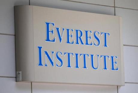 FILE - This July 8, 2014 file photo shows an Everest Institute sign on an office building in Silver Spring, Md. Everest is one of the 28 remaining ground college campuses Corinthian Colleges will shut down, displacing about 16,000 students. The announcement comes less than two weeks after the U.S. Department of Education announced it was fining the for-profit institution $30 million for misrepresentation. In a statement Sunday, April 26, 2015 the Santa Ana, California-based company said it was working with other schools to help students continue their education. The closures include Heald College campuses in California, Hawaii and Oregon, as well as Everest and WyoTech schools in California, Arizona and New York. (AP Photo/Jose Luis Magana, File)
