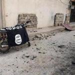 A flag belonging to the Islamic State fighters was seen on a motorbike after forces loyal to Syrian President Bashar Assad recaptured Palmyra.