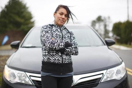 Jessie Cabel, a single mother who has been using Zemcar to transport her daughters, is also driving for the company.
