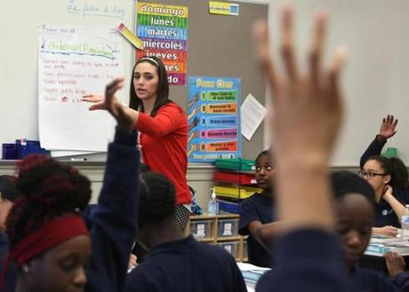 Teacher Chelsea Azzari led a discussion in her English class at the Brooke Charter Schools? Mattapan campus. 
