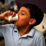 Less than a third of Boston school buildings still use tap water. 