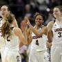 Uconn players were a happy bunch near the end of their 60-point win over Mississippi State in the NCAA regional semifinals.