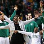 BOSTON, MA - MARCH 21: From left, Jared Sullinger #7 of the Boston Celtics, R.J. Hunter #28, Jae Crowder #99, Kelly Olynyk #41 and Terry Rozier #12 react after Isaiah Thomas #4 scored against the Orlando Magic during the fourth quarter at TD Garden on March 21, 2016 in Boston, Massachusetts.The Celtics defeat the Magic 107-96. (Photo by Maddie Meyer/Getty Images)