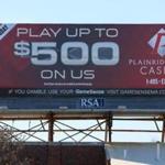 A billboard on the Southeast Expressway in Boston advertised Plainridge Park Casino, which is offering $500 in ?free play.?