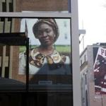 A portrait of Omowunmi Martins is part of Mary Beth Meehan?s installation ?SeenUnseen? in Providence.