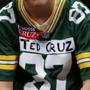 Noah Ryan, 13, wears a Green Bay Packers jersey with the name of Republican presidential candidate Sen. Ted Cruz, R-Texas, during a campaign event, Sunday, April 3, 2016, in Green Bay, Wisc. (AP Photo/Paul Sancya)