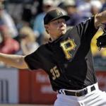 Pittsburgh Pirates relief pitcher Mark Melancon goes into his windup against the Boston Red Sox during the fourth inning of a spring training baseball game Wednesday, March 9, 2016, in Bradenton, Fla. (AP Photo/Chris O'Meara)
