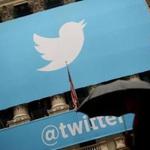 (FILES) This file photo taken on November 7, 2013 shows the logo of Twitter on the front of the New York Stock Exchange (NYSE) in New York. Twitter revamped its timeline on February 10, 2016, allowing the 