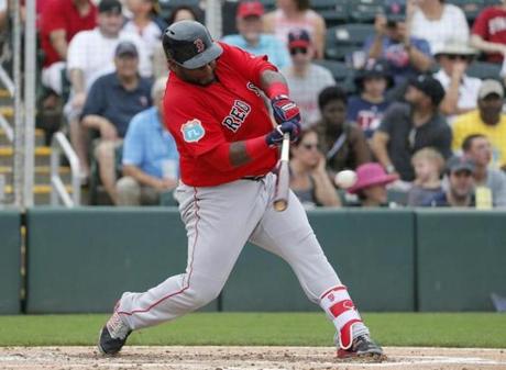 Boston Red Sox's Pablo Sandoval swings at a pitch from Minnesota Twins' Tommy Milone and hits for a single in the second inning of a spring training baseball game, Tuesday, March 29, 2016, in Fort Myers, Fla. (AP Photo/Tony Gutierrez)

