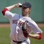 Boston Red Sox starting pitcher Clay Buchholz pitches during the first inning of a baseball game against the Toronto Blue Jays at Fenway Park, Monday, April 18, 2016, in Boston. (AP Photo/Mary Schwalm)