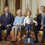 Britain's Prince George stands on foam blocks during a photo shoot for the Royal Mail in the summer of 2015 in the White Drawing Room at Buckingham Palace.