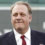 FILE - In this Aug. 3, 2012, file photo, former Boston Red Sox pitcher Curt Schilling looks on after being introduced as a new member of the Boston Red Sox Hall of Fame before a baseball game between the Red Sox and the Minnesota Twins at Fenway Park in Boston. Schilling is defending himself after making comments on social media about transgender people, saying he was expressing his opinion. (AP Photo/Winslow Townson, File)