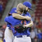 Chicago Cubs starting pitcher Jake Arrieta, left, celebrates with catcher David Ross after the final out of his no-hitter in a baseball game against the Cincinnati Reds, Thursday, April 21, 2016, in Cincinnati. The Cubs won 16-0. (AP Photo/John Minchillo)