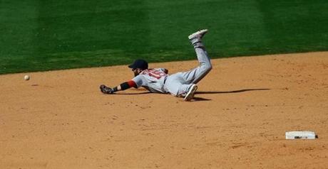 Dustin Pedroia dove, but couldn?t come up with this ground ball during the Astros? four-run fifth inning.
