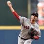 ?He threw the ball well,? Hall of Famer Tom Glavine, a Billerica native, said of Red Sox pitcher Rick Porcello. Above: Porcello threw a pitch during the first inning Monday. 