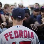 Red Sox second baseman Dustin Pedroia signed autographs before the start of Tuesday?s game in Atlanta.