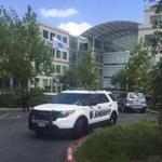 A Santa Clara County sheriff's vehicle was parked outside one of the main office buildings of the Apple campus in Cupertino, Calif. on Wednesday.