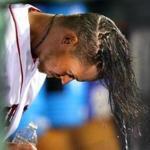 Boston--4/28/16- Boston red Sox vs Atlanta Braves. Sox starting pitcher Clay Buchholz poured a bottle of water over his hair in the dugout in the 5th inning. Boston Globe staff Photo by John Tlumacki (sports)