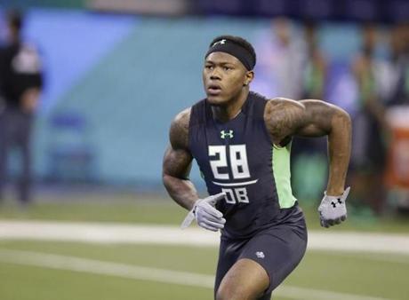Alabama defensive back Cyrus Jones ran a drill at the NFL football scouting combine in March. 
