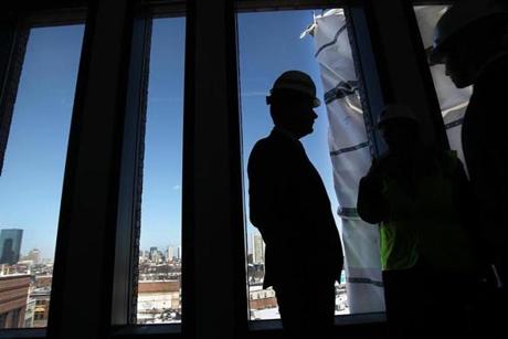 Mayor Martin Walsh got a tour of the Ferdinand Building under construction in Dudley Square. 
