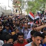 Followers of cleric Moqtada al-Sadr poured into the Green Zone in Baghdad on Saturday. 