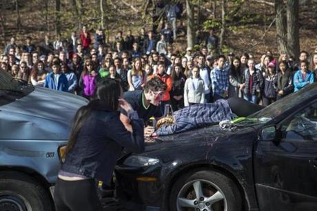 The scene of a mock accident simulation put on by Lexington High School to highlight the issues of underage drinking and impaired driving. 
