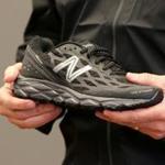 At the New Balance factory in Lawrence, Isali Ruiz formed running shoes on a mold. 