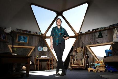 Kate Daloz inside her childhood home, a geodesic dome in West Glover, Vt. 
