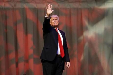 Republican presidential candidate Donald Trump waves a rally at The Palladium in Carmel, Ind., Monday, May 2, 2016. (AP Photo/Michael Conroy)
