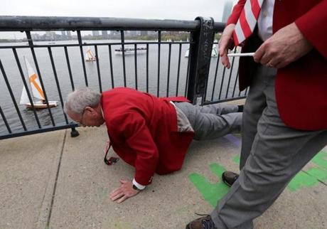 Grand Marshal Oliver Smoot recreated his famous ?Smoot? measurement on the Mass. Ave. bridge during the parade.
