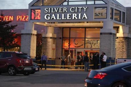 Crime-scene tape blocked off an entrance to the Silver City Galleria on Taunton Tuesday evening.
