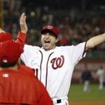 Washington Nationals starting pitcher Max Scherzer celebrates with his teammates after a baseball game against the Detroit Tigers at Nationals Park, Wednesday, May 11, 2016, in Washington. Scherzer struck out 20 batters, tying the major league nine-inning record. The Nationals won 3-2. (AP Photo/Alex Brandon)
