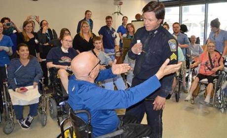 Mark Wahlberg greets patients Spaulding Hospital Cambridge after filming scenes for ?Patriots Day.?
