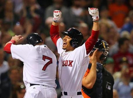 Boston-5/12/16- Boston Red Sox vs Houston Astros- Sox Mookie Betts is jubilant at home plate as he is congratulated by Sox Christian Vazquez after 6th inning 3-run homer.Boston Globe staff Photo by John Tlumacki (sports)
